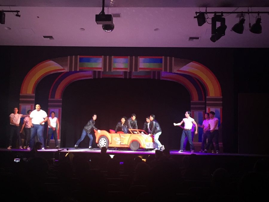 The actors perform Grease Lightning