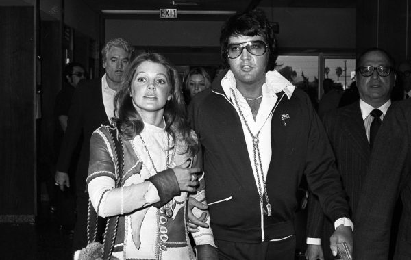 A picture taken of Elvis and Priscilla Presley walking together after attending a divorce hearing. 
(photo: Wikimedia Commons)