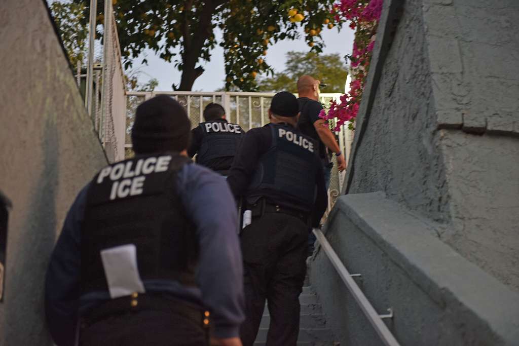 ICE officers on the way to arrest people in Los Angeles. (photo: Creative Commons PDM 1.0)