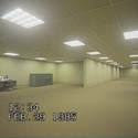 Endless rooms with yellow paneled walls are filmed with a 80s-styled camera.
(Image: Creative Commons)